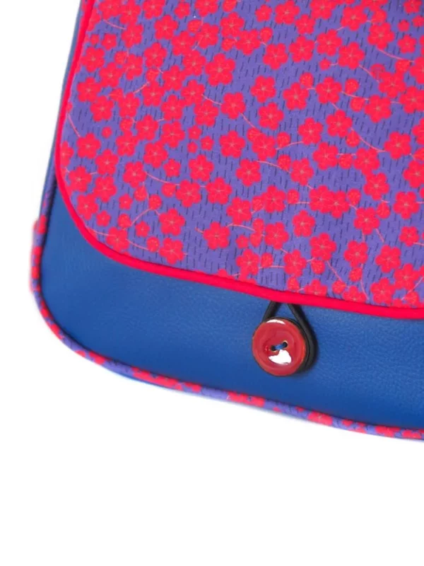 Sac réversible Yoko zoom sur bouton coco rouge