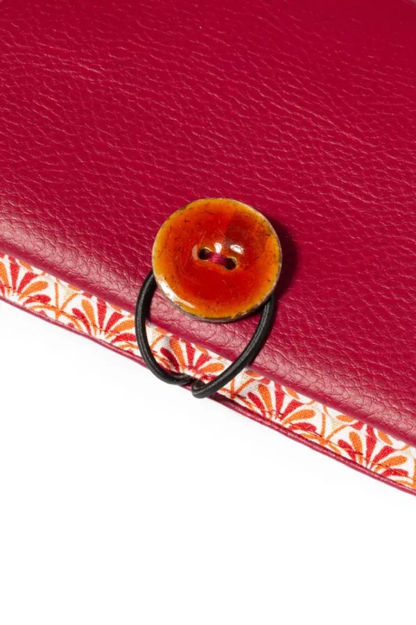 Portefeuille femme Sarah zoom sur le bouton coco rouille
