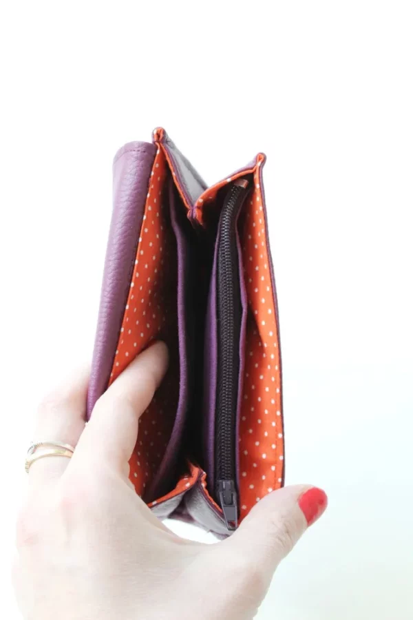 Porte monnaie femme simili cuir violet tissu imprimé orange pois intérieur proche zippée compartiments