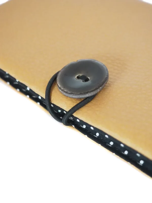 Porte monnaie doré noir pois zoom sur bouton coco noir