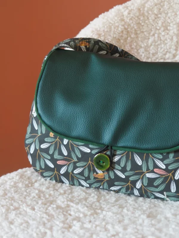 Sac réversible pioupiou zoom sur bouton coco vert