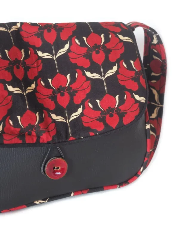 Sac à main femme réversible Aline zoom sur bouton coco rouge