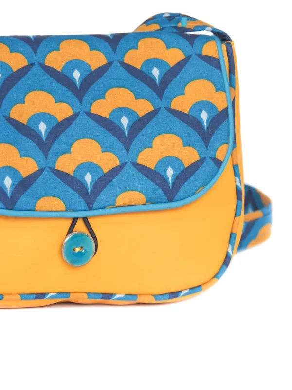 Sac réversible Paola zoom sur bouton turquoise