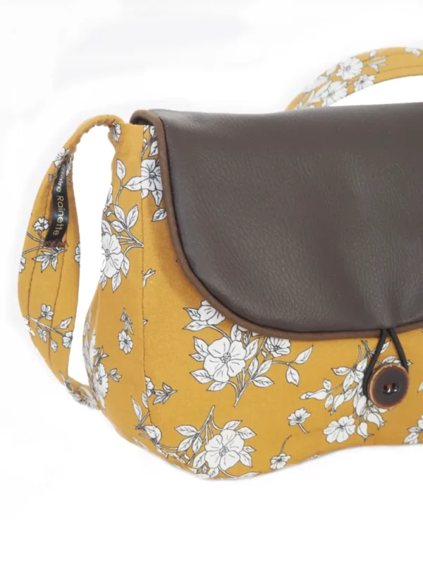 Sac réversible femme zoom sur bouton coco marron tissu imprimé moutarde fleurs
