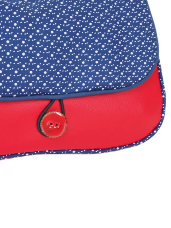 Sac réversible bleu rouge pois zoom sur bouton coco rouge