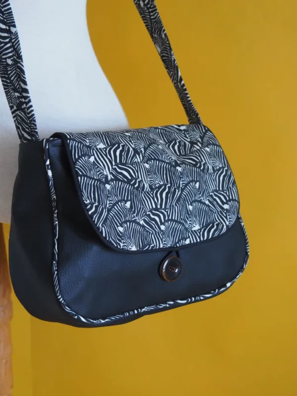 Sac réversible femme simili cuir noir tissu imprimé vue profil